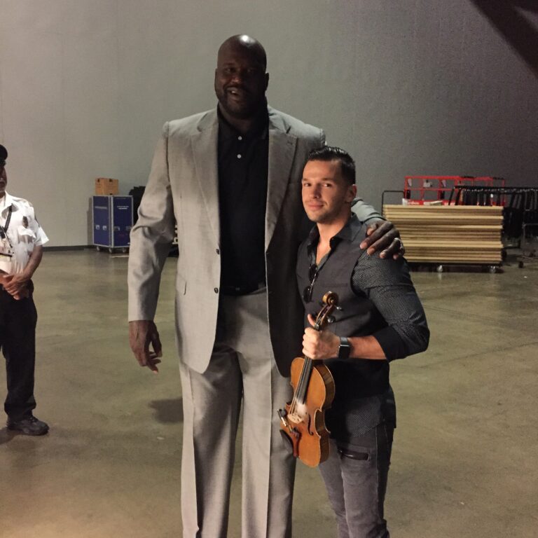 Svet the violinist performs live at the NBA half show and meets Shaquille O'Neal.