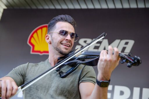 Electro Hip Hop Violinist Svet performs at the SEMA event sponsored by Shell.